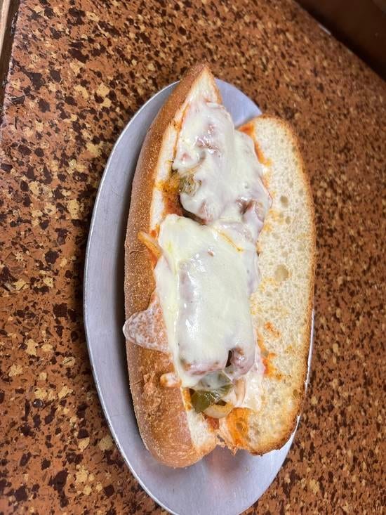 Sausage And Peppers Parmigiana Hero.
